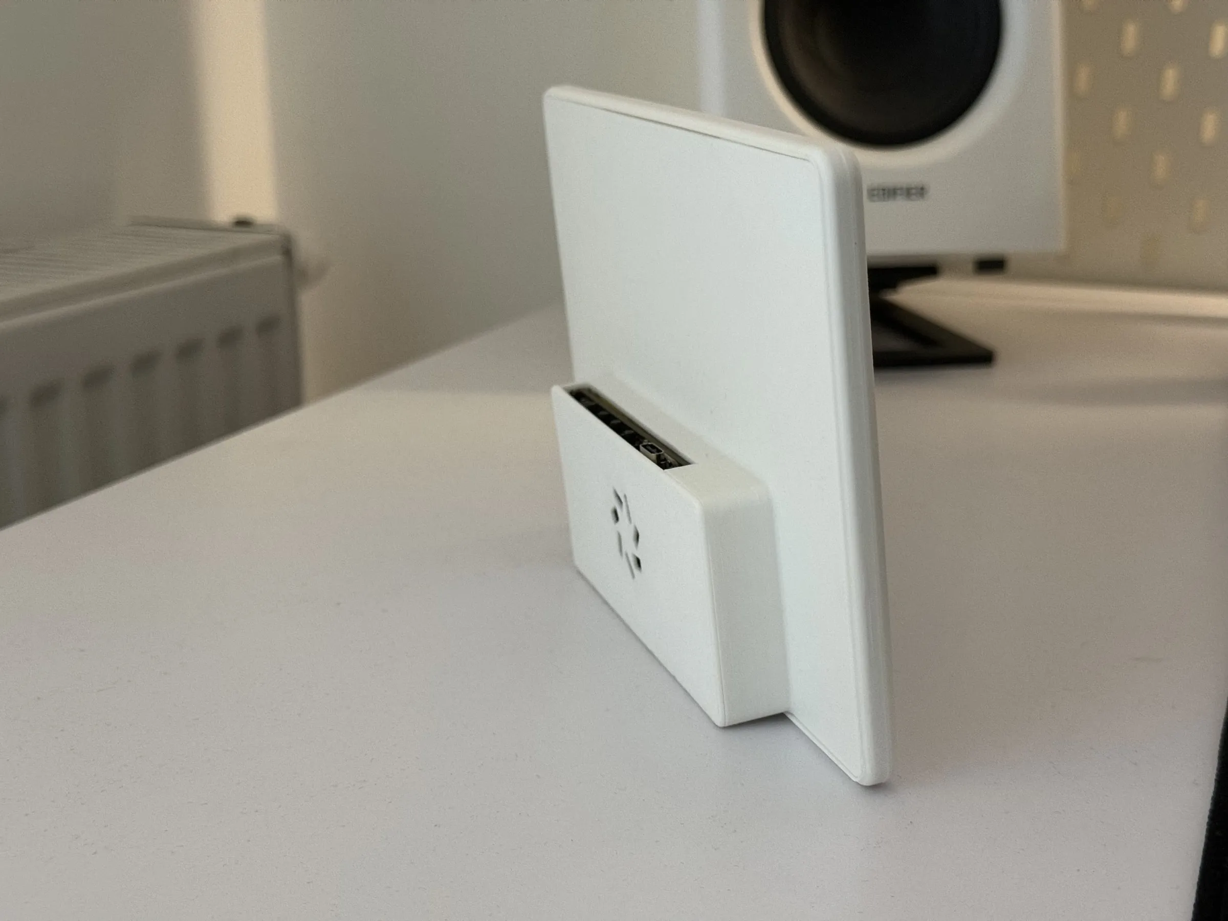 The case from behind at an angle, standing on its own and leaning back slightly